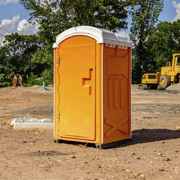 how often are the portable restrooms cleaned and serviced during a rental period in Mancelona